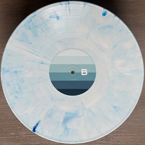 The Maine American Candy white and blue swirl vinyl record, side B