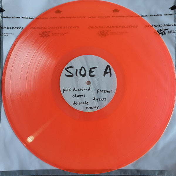 Charli XCX How I'm Feeling Now orange neon translucent vinyl record, side A label