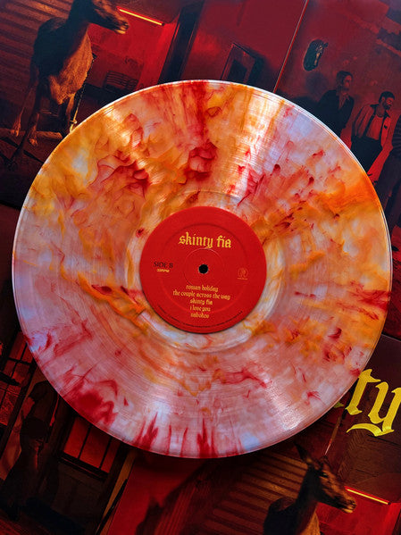 Fontaines D.C. Skinty Fia red, orange smoke vinyl record and label on cover