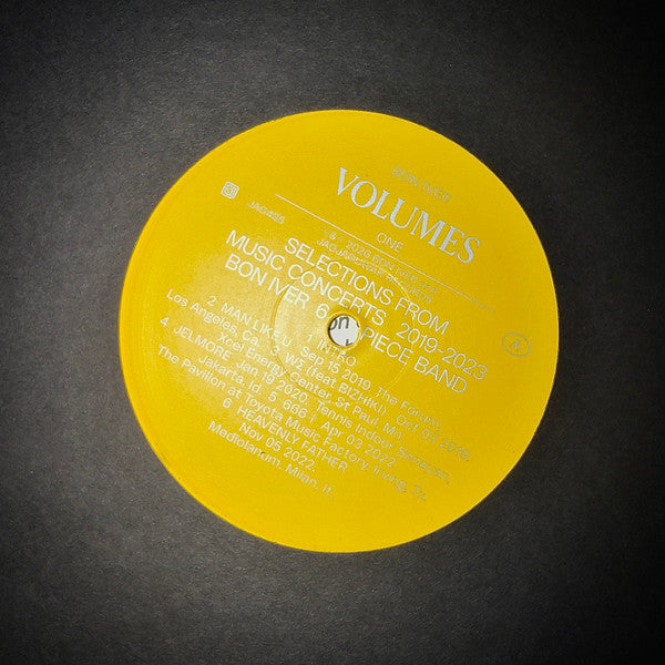 Bon Iver : Volumes One (Selections From Music Concerts 2019-2023 Bon Iver 6 Piece Band) (LP, Comp, Ltd, Yel)