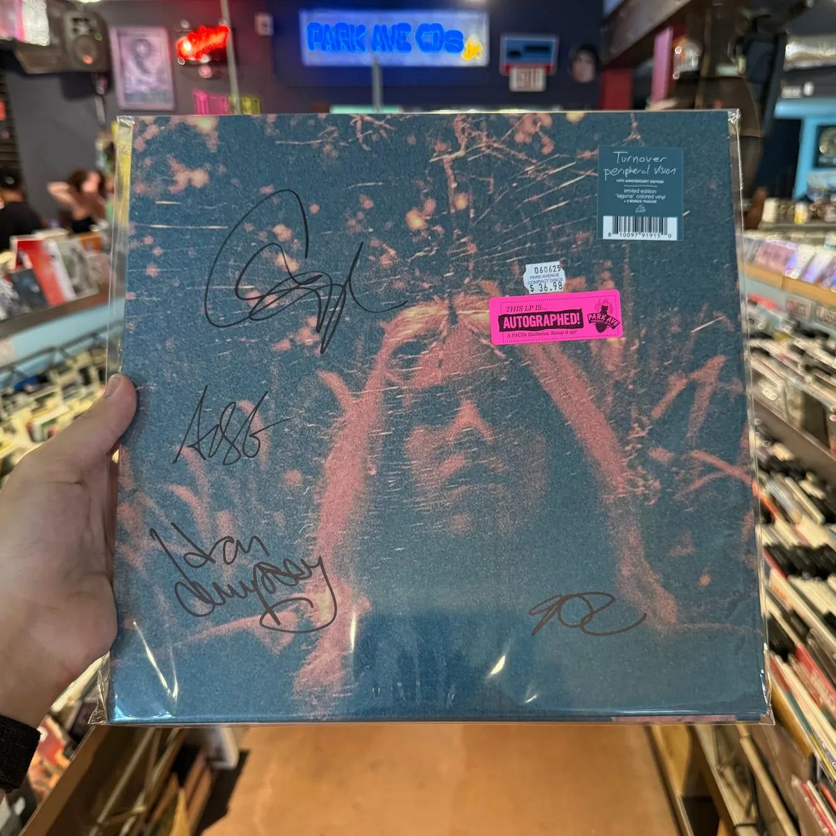 Turnover Peripheral Vision vinyl LP front cover autographed by the band, with autographed sticker