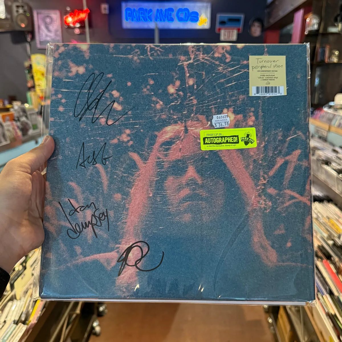 Turnover Peripheral Vision citrus vinyl LP front cover autographed by the band, with autographed sticker