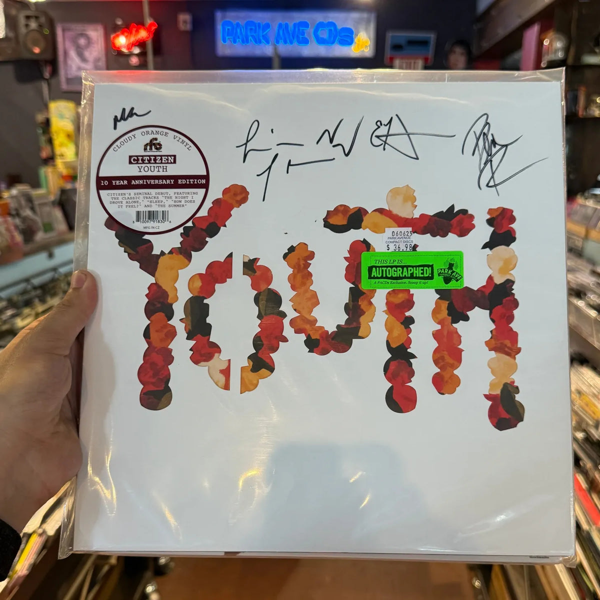 Citizen Youth vinyl LP front cover autographed by the band, with autographed sticker