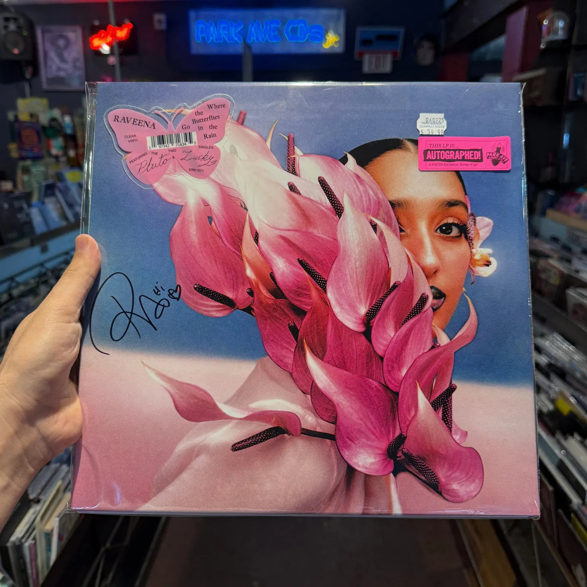 Raveena Where the Butterflies Go in the Rain vinyl LP front cover autographed by Raveena